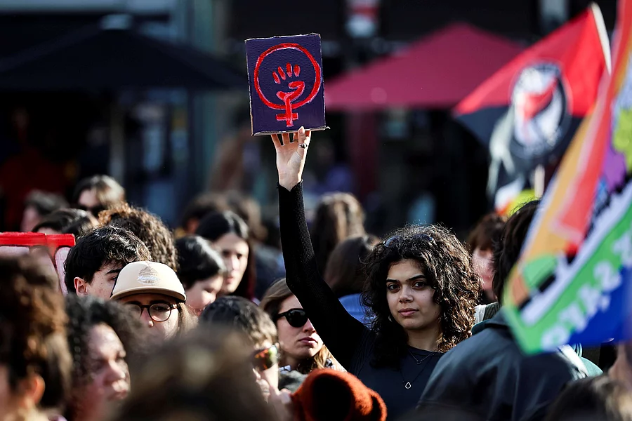 Women demonstrate at an international feminist event in Porto, Portugal, on March 8, 2026