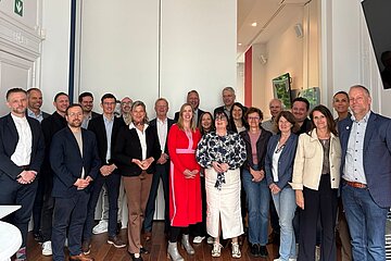 Group pictures of representatives from the Friedrich-Ebert-Stiftung (FES) and European trade union confederations in Brussels.