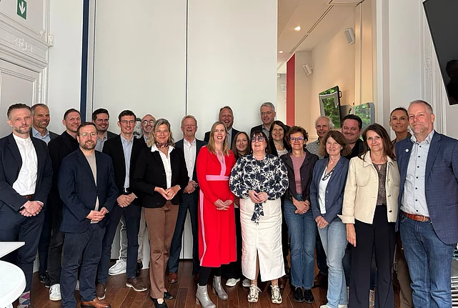 Group pictures of representatives from the Friedrich-Ebert-Stiftung (FES) and European trade union confederations in Brussels.