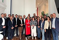 Group pictures of representatives from the Friedrich-Ebert-Stiftung (FES) and European trade union confederations in Brussels.