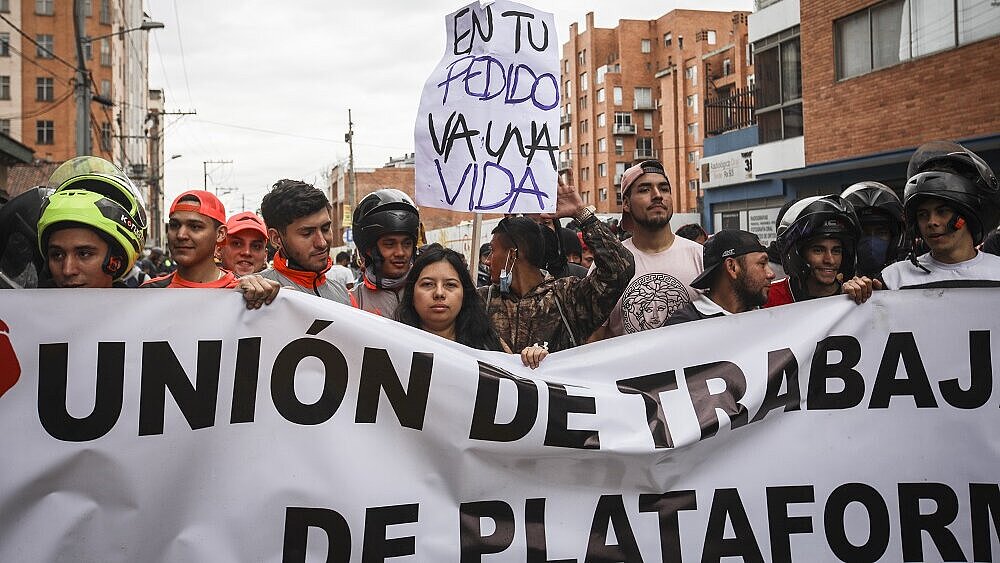 Several dozen food delivery people from the Colombian platform "Rappi" stage a demonstration demanding better working conditions and social guarantees, as well as fairer rates in Bogota, Colombia on March 02, 2022