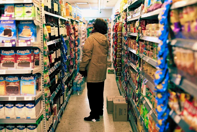 a person standing in the super market