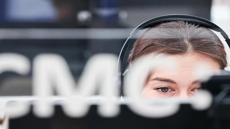 A female workers with headphone on