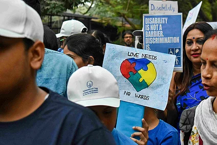 Children with disabilities are participating in a rally on International Day of Persons with Disabilities in Kolkata, India, on December 3, 2023. Various NGOs are organizing an awareness rally to observe International Day of Persons with Disabilities in Kolkata, India