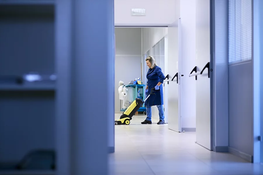 a cleaning lady at the corridor
